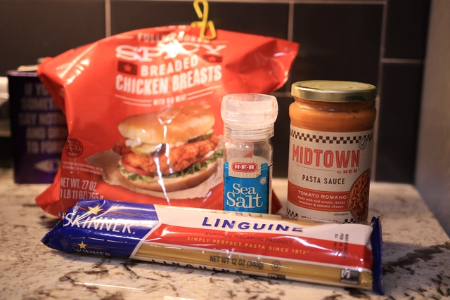 A picture of Chicken Parmigiana on Linguine